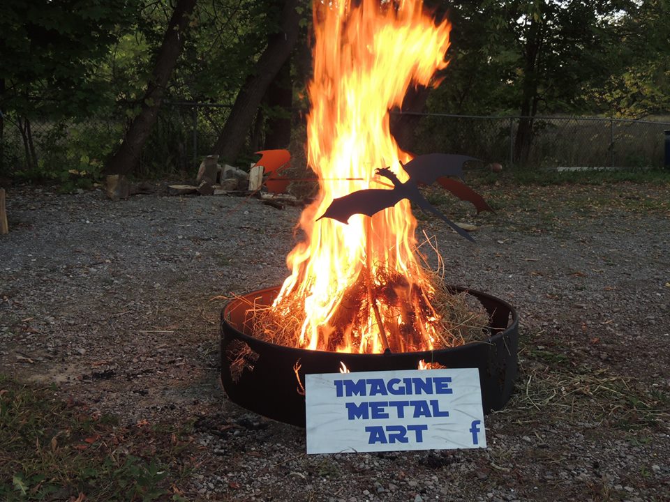 custom metal flying dragons firepit by ImagineMetalArt